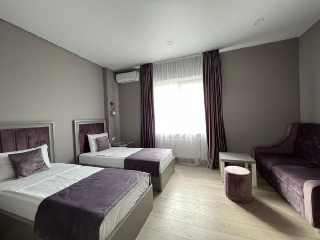 Двухместный номер с 2 отдельными кроватями улучшенный