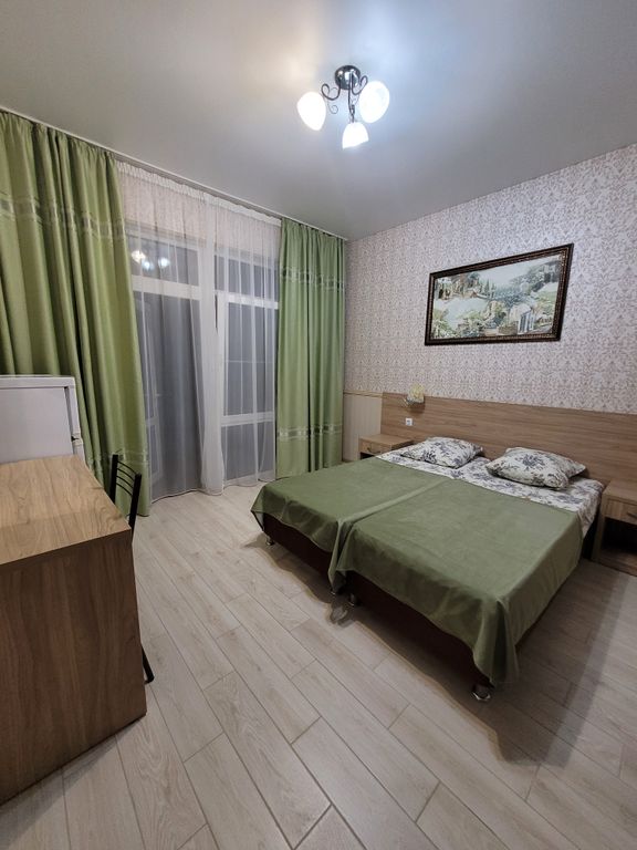 Трёхместный номер люкс с видом на горы