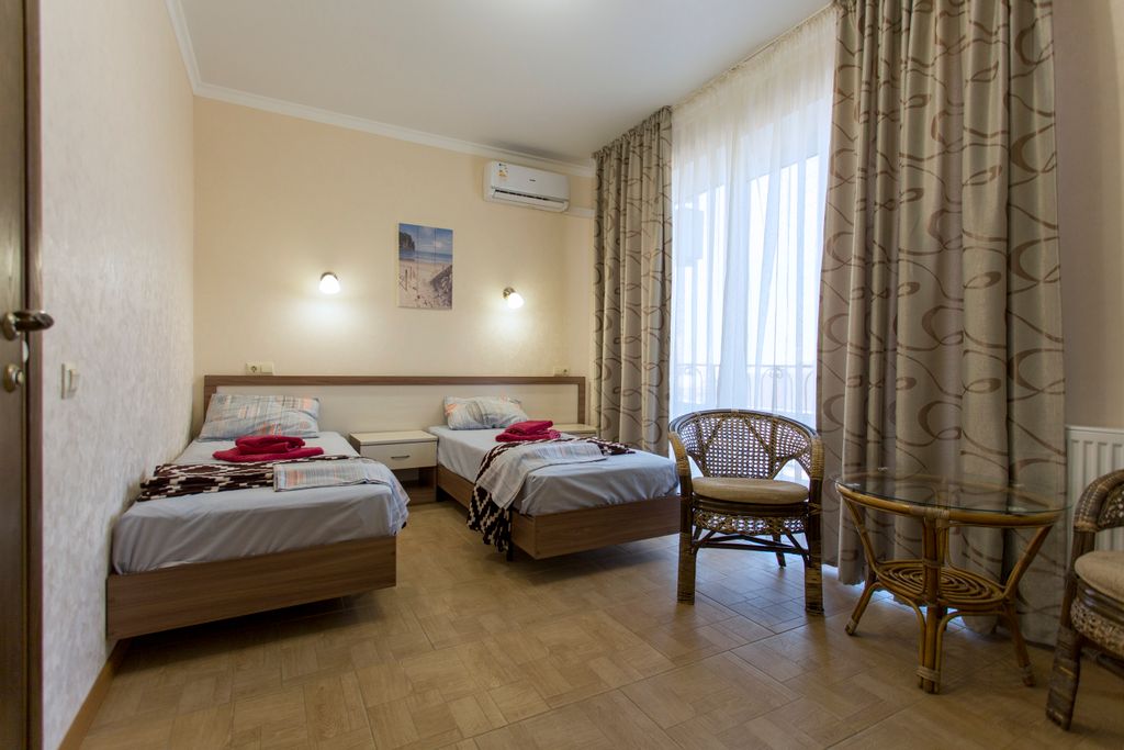 Двухместный номер с 2 отдельными кроватями стандарт с балконом