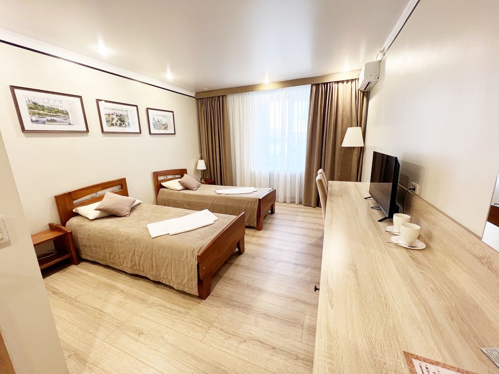 Двухместный номер с 2 отдельными кроватями улучшенный с видом на город