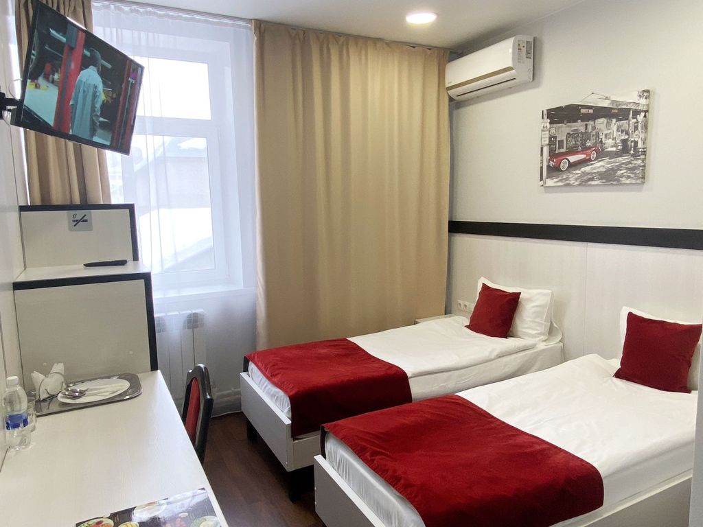 Двухместный номер с 2 отдельными кроватями стандарт