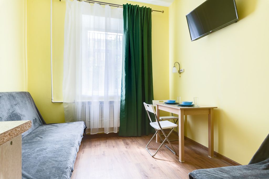 Четырёхместный номер Просторная тихая студия Делюкс в самом центре