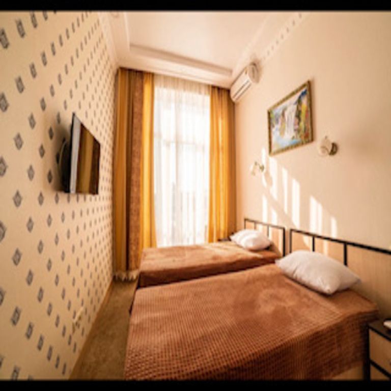 Двухместный номер с 2 отдельными кроватями стандарт