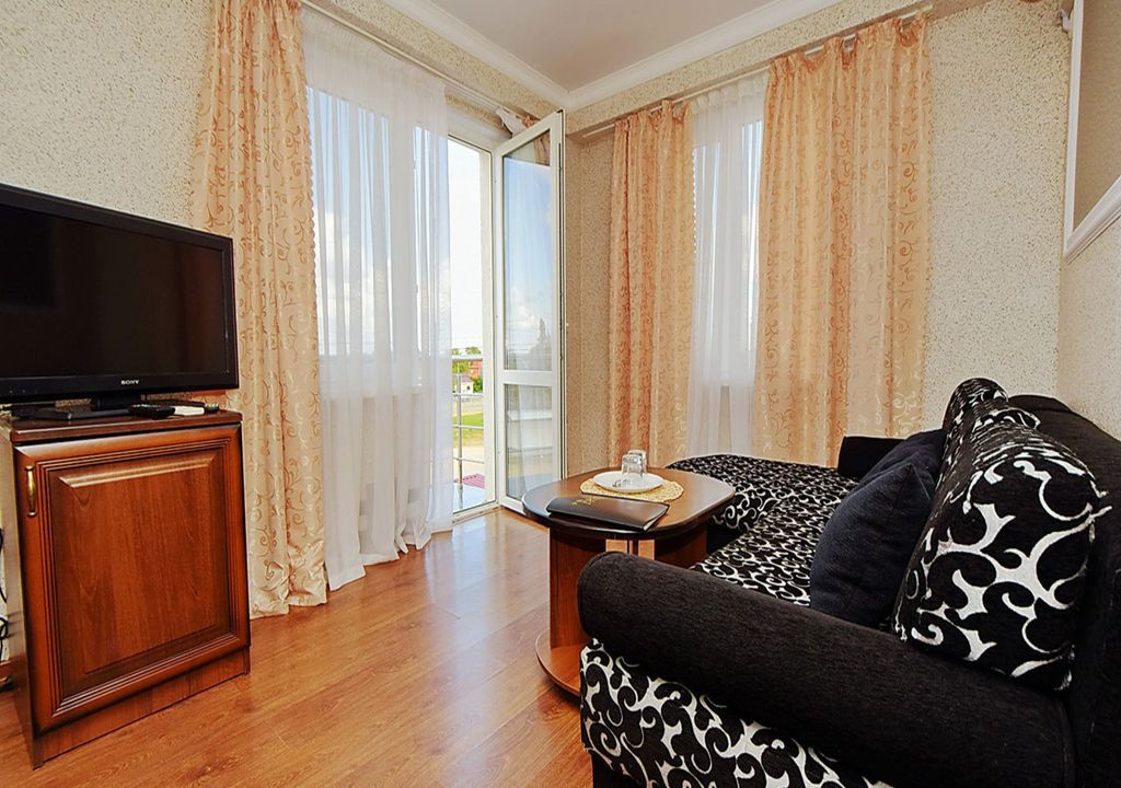 Четырёхместный номер делюкс с балконом