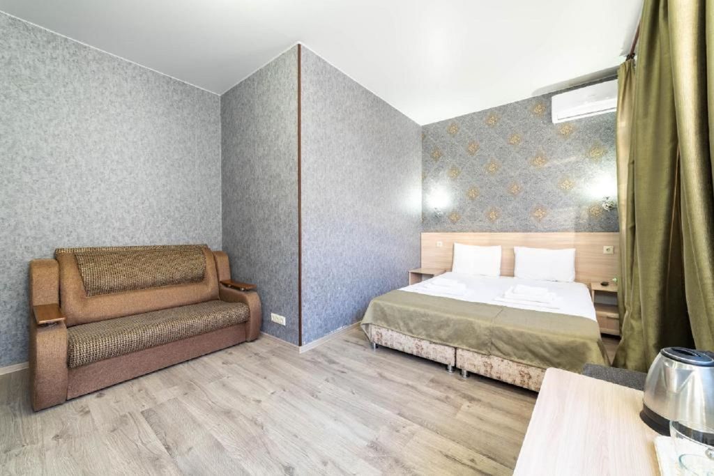 Трёхместный номер полулюкс