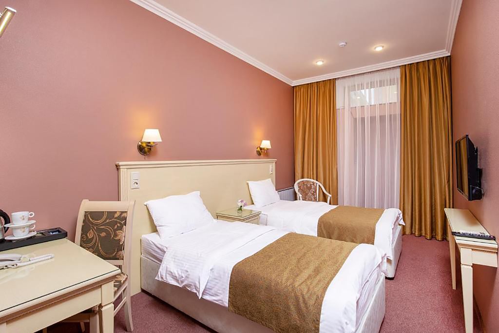 Двухместный номер с 2 отдельными кроватями улучшенный