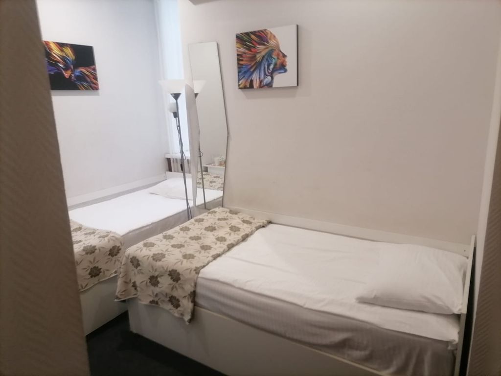 Двухместный номер с 2 отдельными кроватями и ванной комнатой эконом