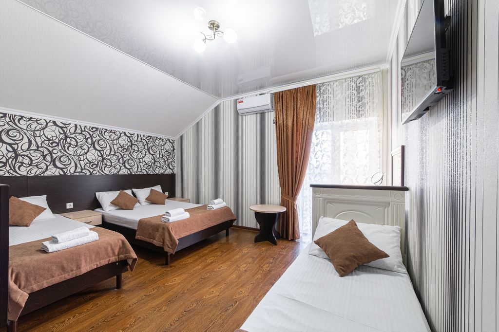 Четырёхместный номер делюкс