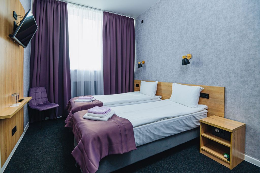 Двухместный номер с 2 отдельными кроватями стандарт