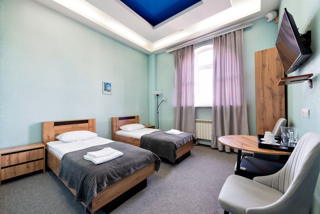 Двухместный номер с 2 отдельными кроватями улучшенный