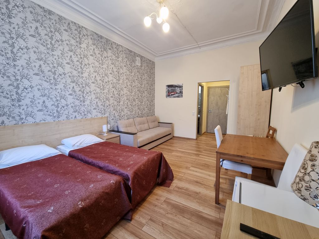 Четырёхместный комфорт улучшенный с раздельными кроватями