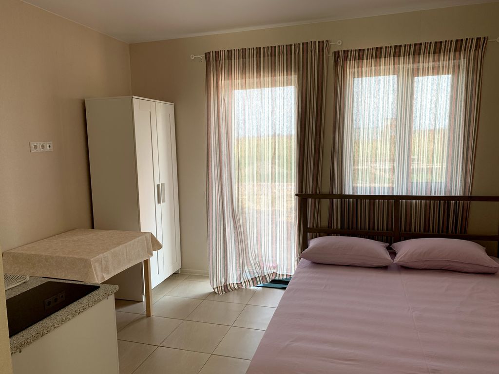 Четырёхместный номер номер с кухней и террасой