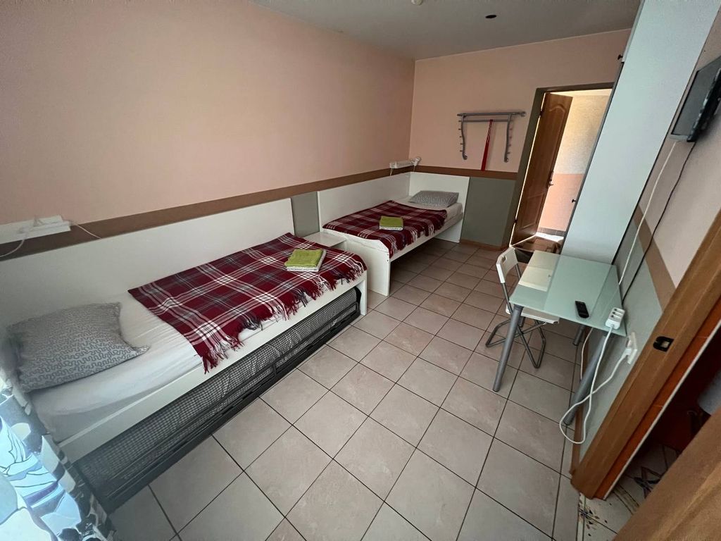 Двухместный номер с 2 отдельными кроватями Стандартный двухместный с дополнительной кроватью