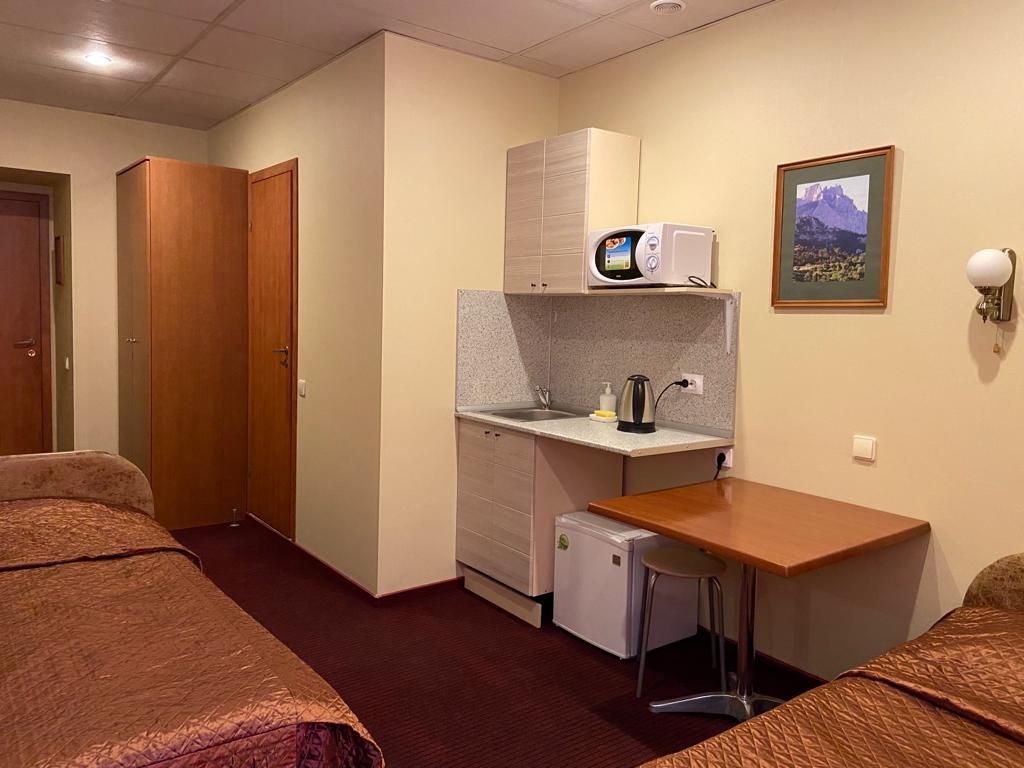 Двухместный номер с 2 отдельными кроватями стандарт