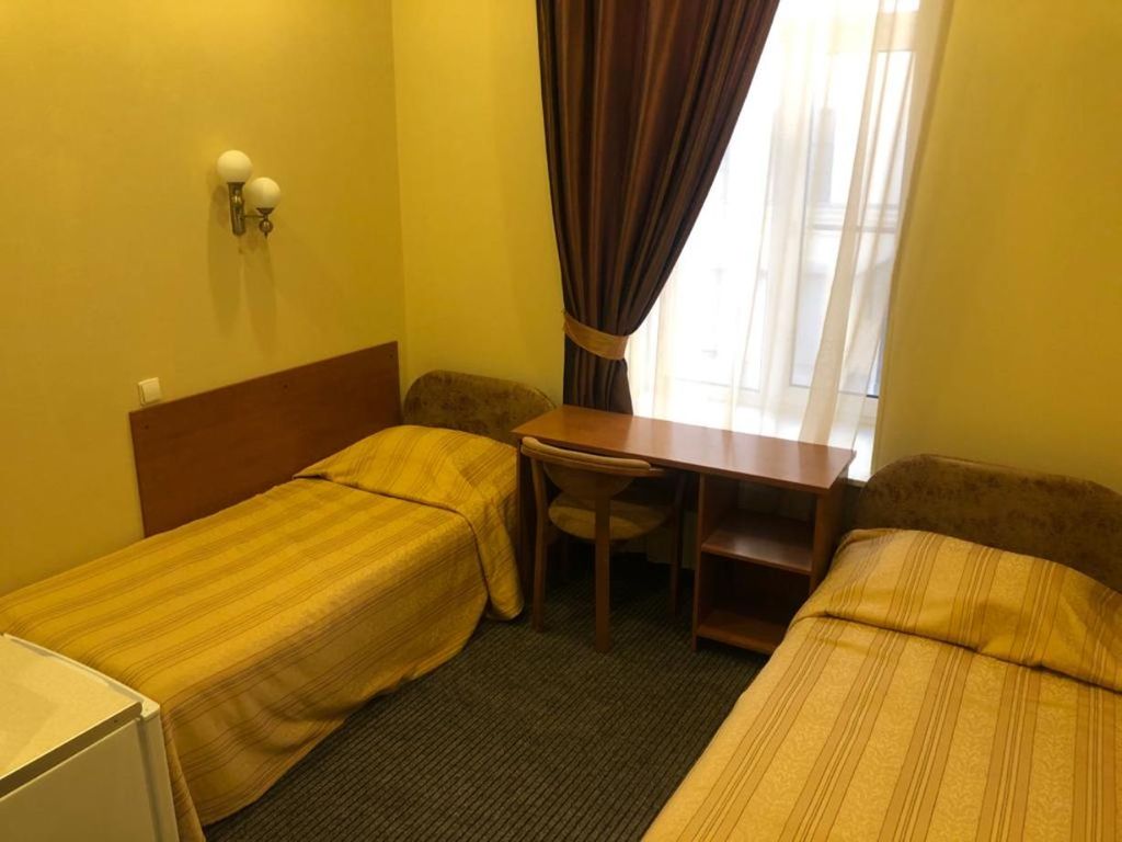 Двухместный номер с 2 отдельными кроватями стандарт