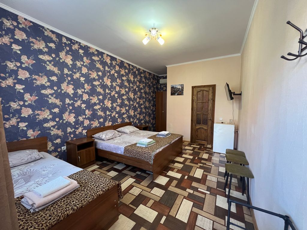 Трёхместный номер Трехместный номер с террасой