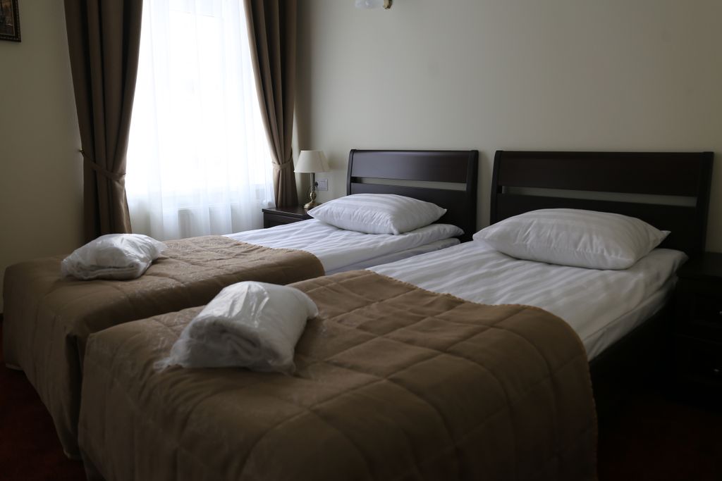 Двухместный номер с 2 отдельными кроватями стандарт с двумя односпальными кроватями