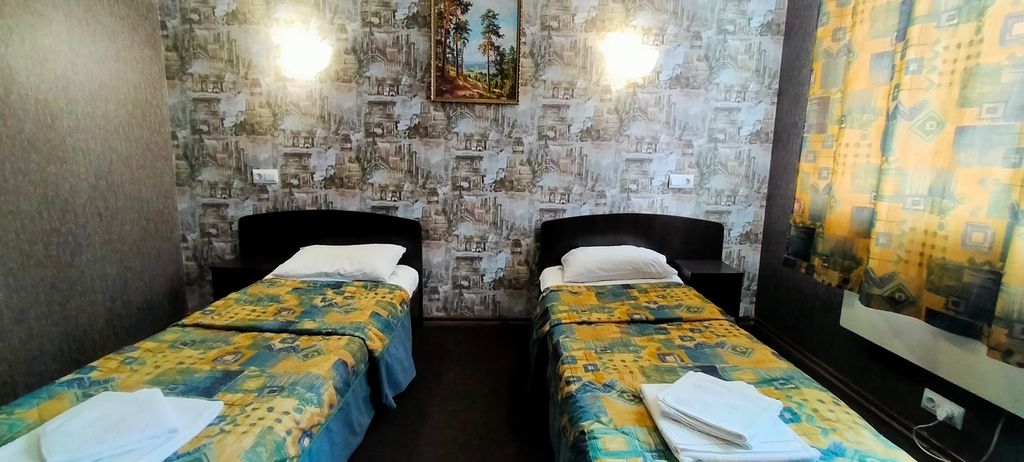 Двухместный номер с 2 отдельными кроватями улучшенный
