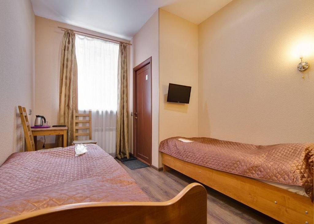 Двухместный номер с 2 отдельными кроватями и собственной ванной комнатой