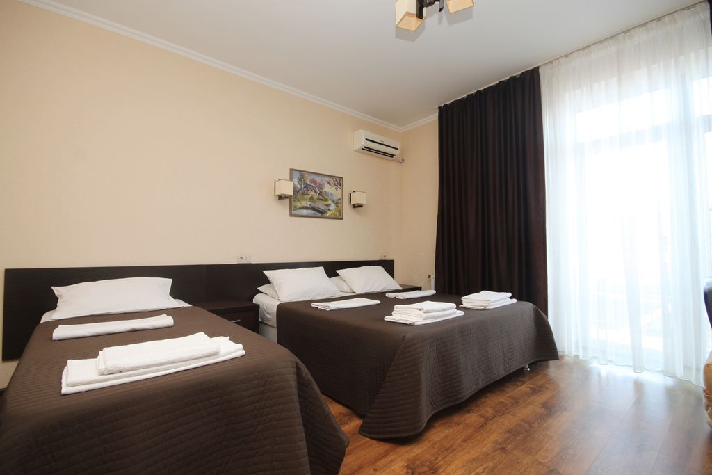 Трёхместный номер полулюкс