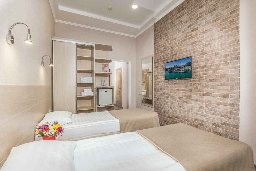 Двухместный номер с 2 отдельными кроватями студио-стандарт 2 этаж