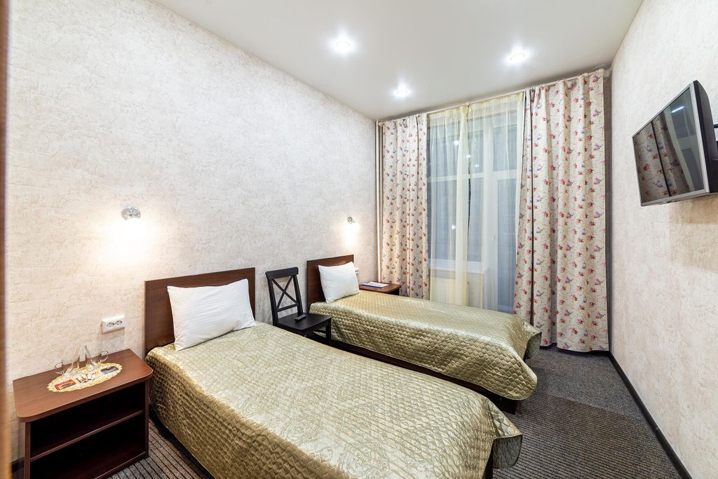 Двухместный номер с 2 отдельными кроватями стандарт