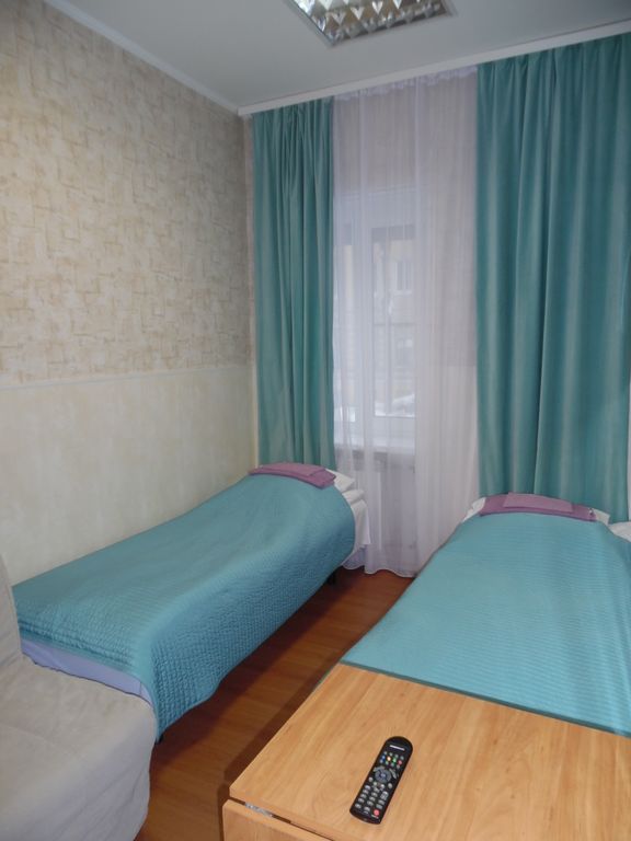 Двухместный номер с 2 отдельными кроватями и ванной комнатой на 2 номера