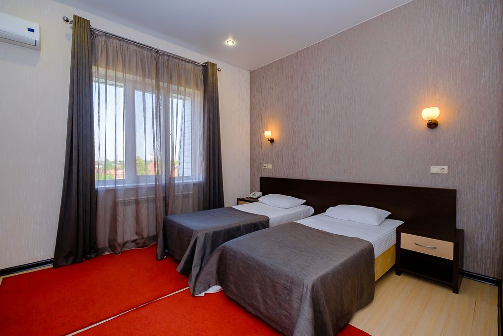 Двухместный номер с 2 отдельными кроватями стандарт