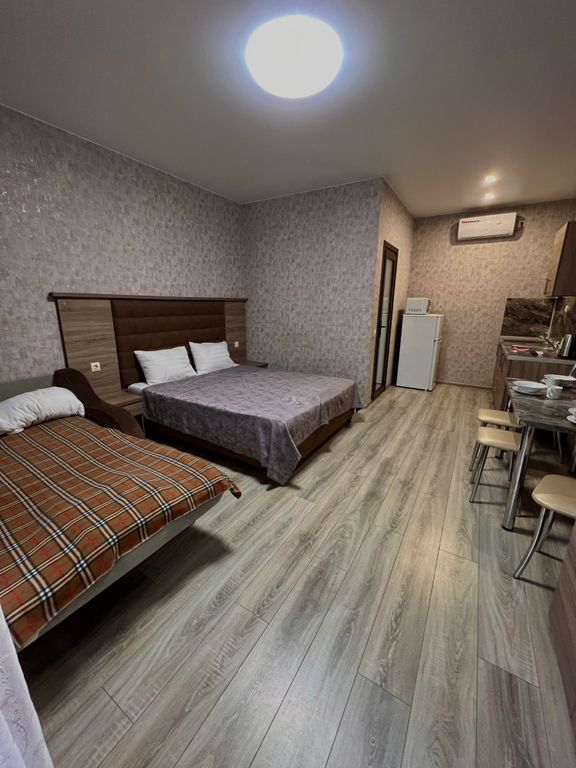 Трёхместный номер люкс с видом на горы