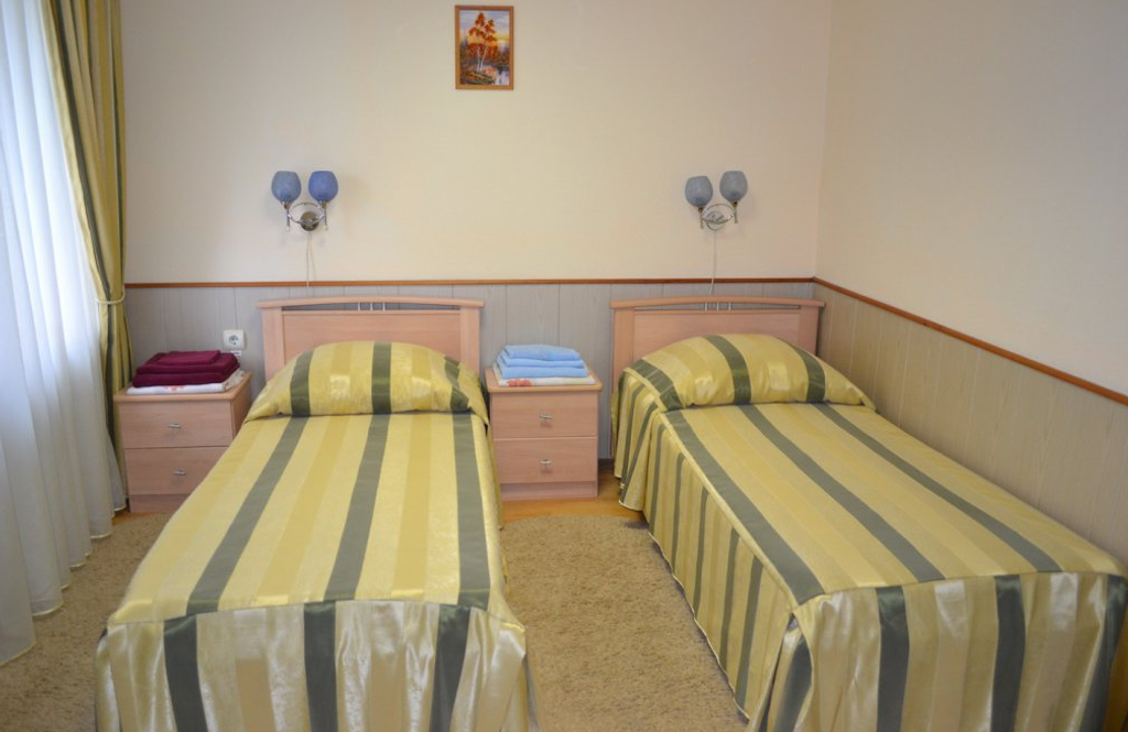 Двухместный номер с 2 отдельными кроватями стандарт