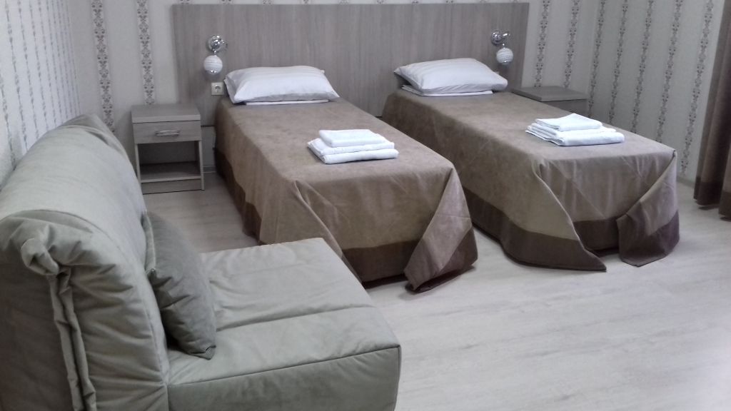 Двухместный номер с 2 отдельными кроватями стандарт