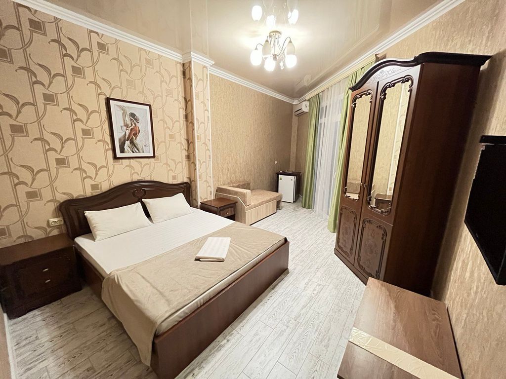 Трёхместный номер стандарт с балконом