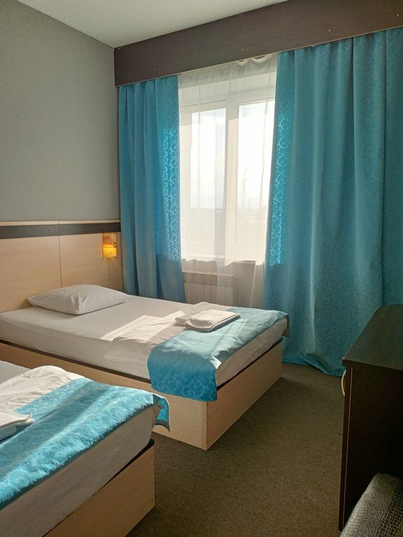 Двухместный номер с 2 отдельными кроватями стандарт