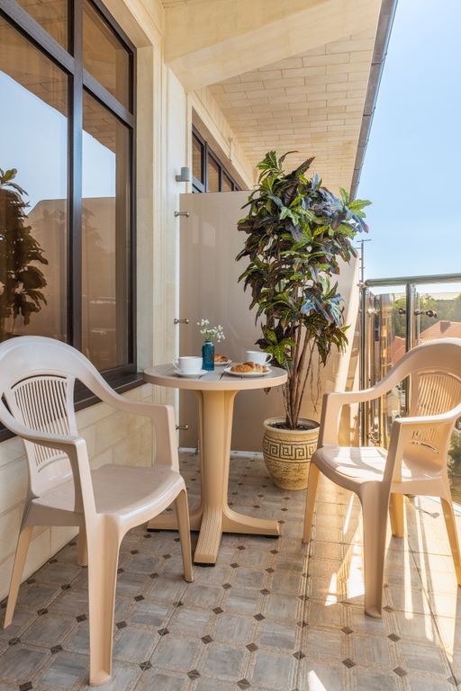 Четырёхместный номер Люкс с балконом