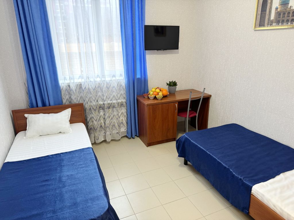 Двухместный номер с 2 отдельными кроватями стандарт