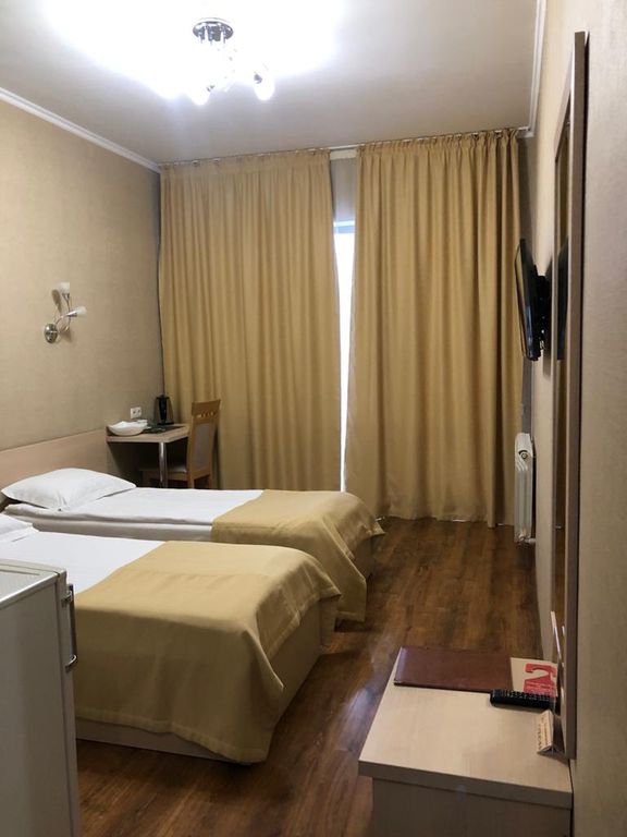 Двухместный номер с 2 отдельными кроватями Стандарт с двумя раздельными кроватями