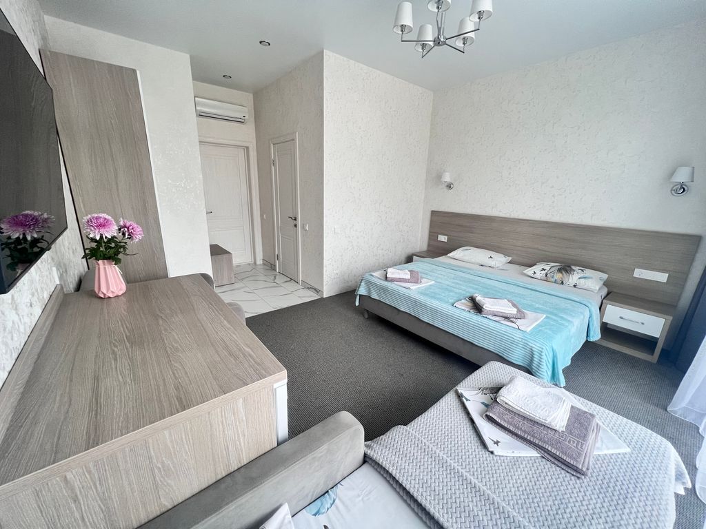 Трёхместный номер  делюкс