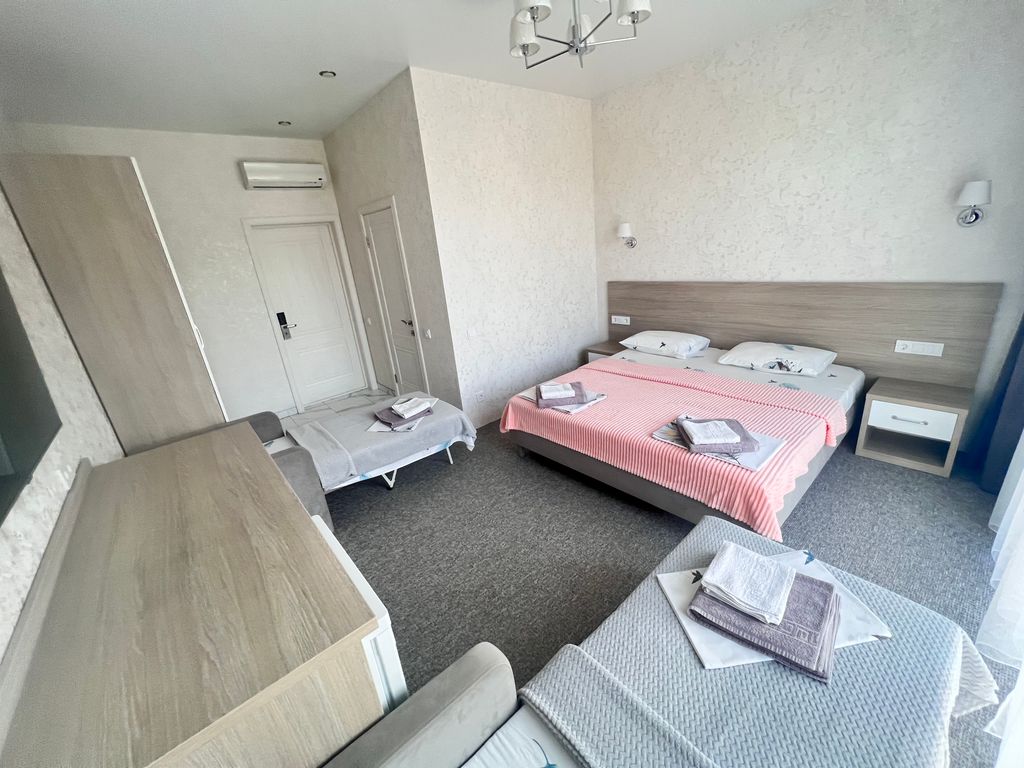 Четырёхместный номер Четырёхместный номер Делюкс