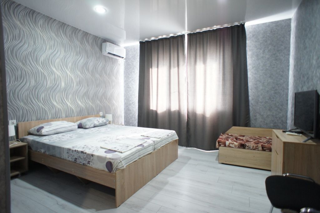 Трёхместный номер улучшенный с видом на горы