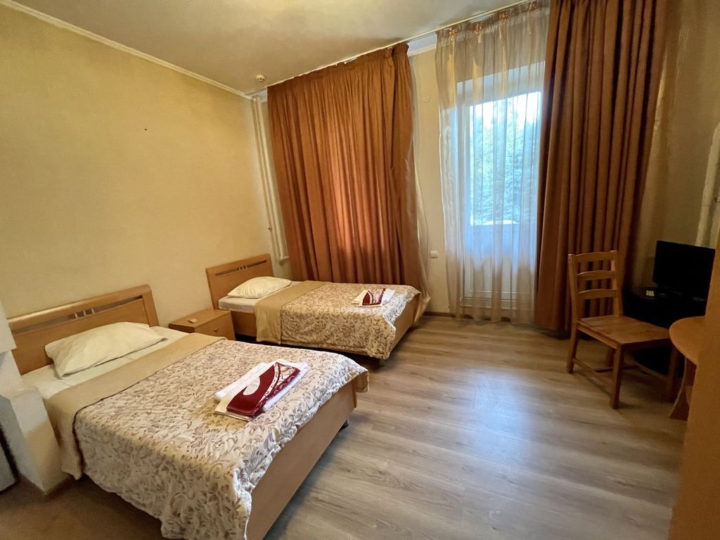 Двухместный номер с 2 отдельными кроватями улучшенный