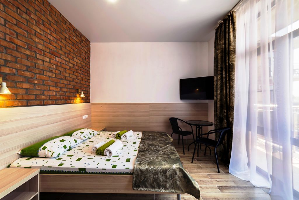 Двухместный номер с 1 кроватью делюкс с балконом или раздельные кровати+ диван2