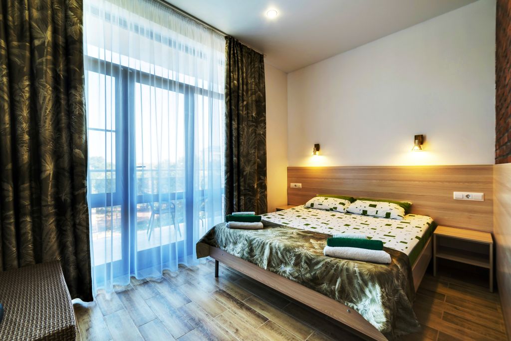 Семейный номер стандарт-семья с балконом, парк кресло-футон