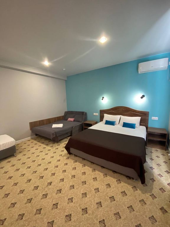 Четырёхместный номер улучшенный с видом на горы