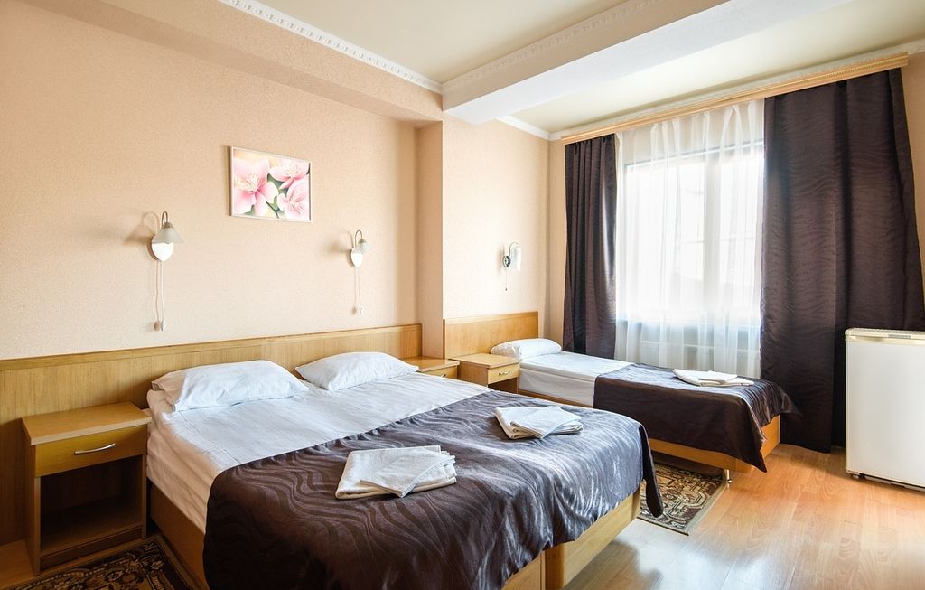 Трёхместный номер Стандарт с балконом