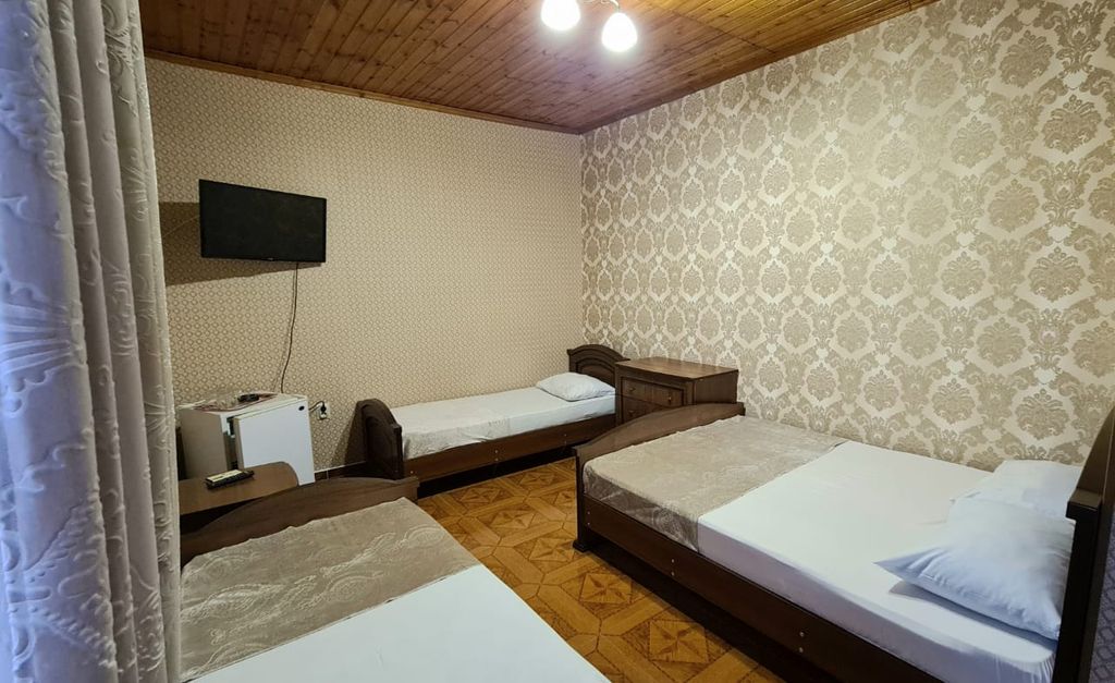 Четырёхместный номер улучшенный с видом на горы