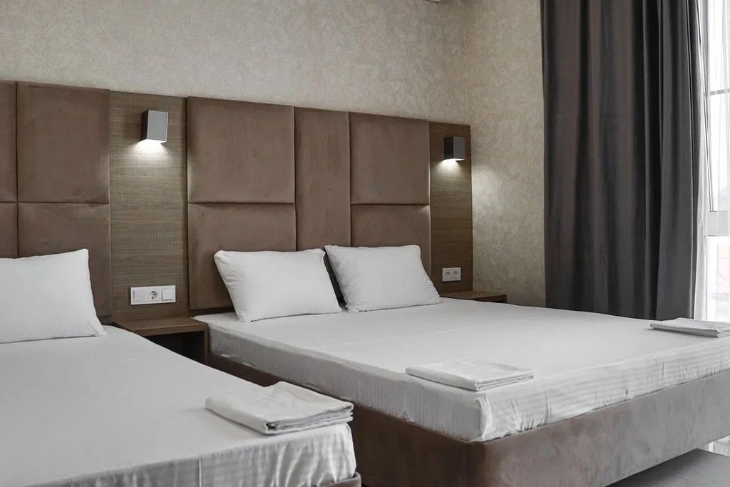 Трёхместный номер улучшенный с видом на море