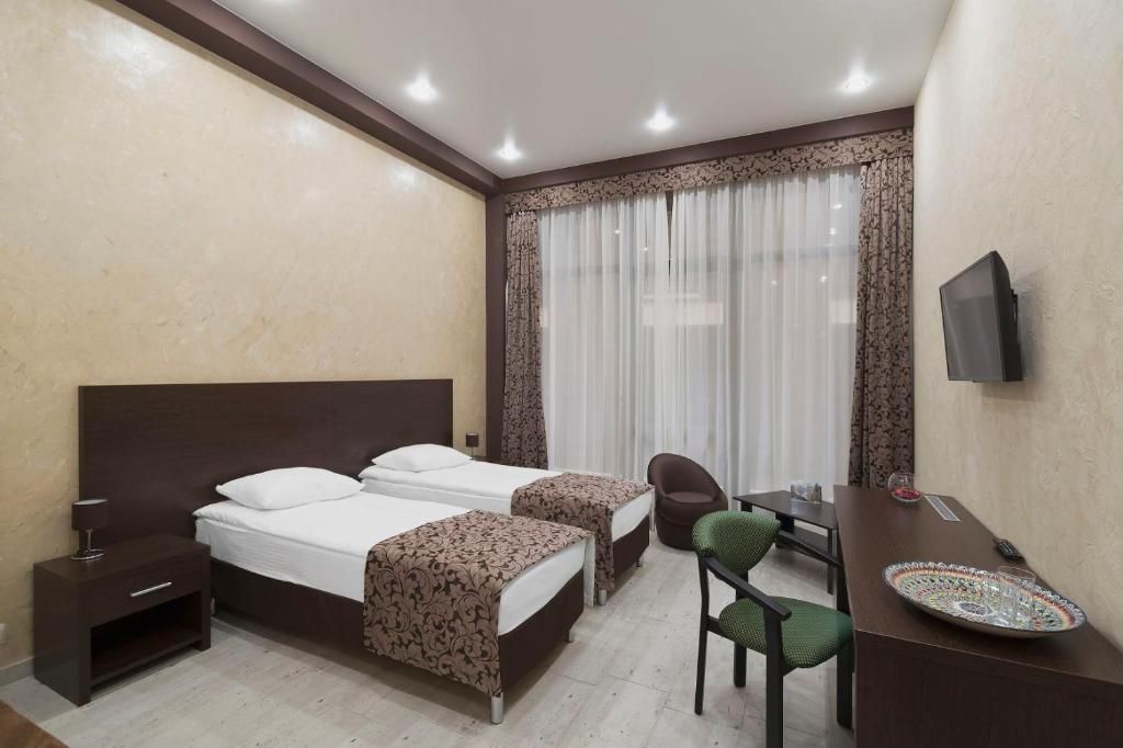 Двухместный номер с 2 отдельными кроватями этаж 1 № 5