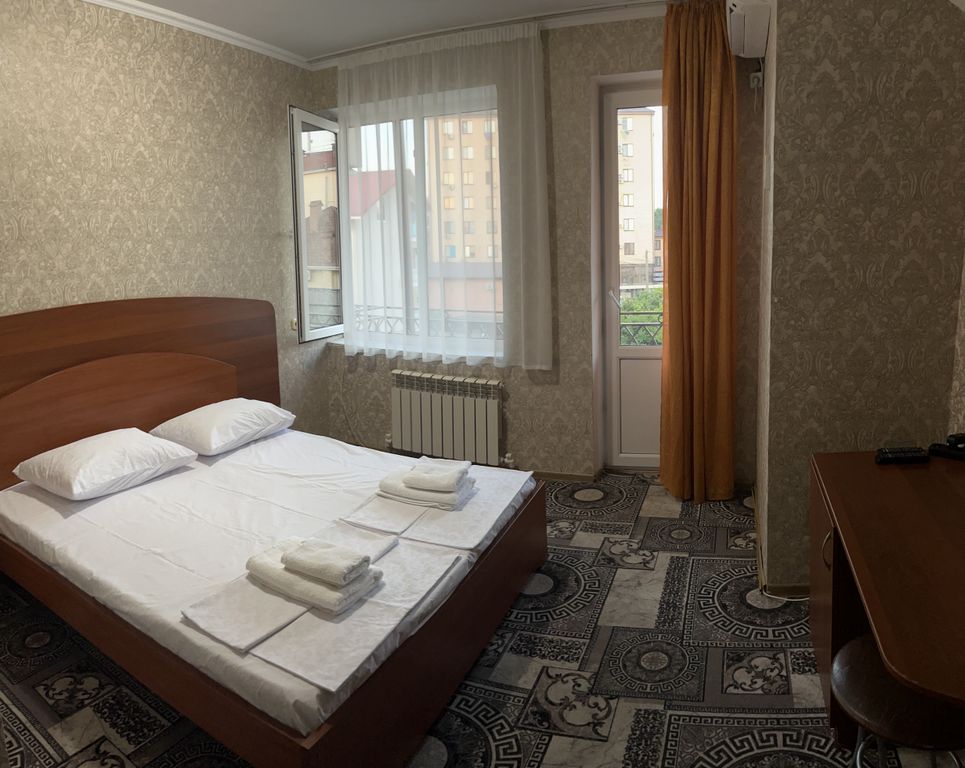 Двухместный номер с 1 кроватью или двумя односпальными кроватями, стандарт