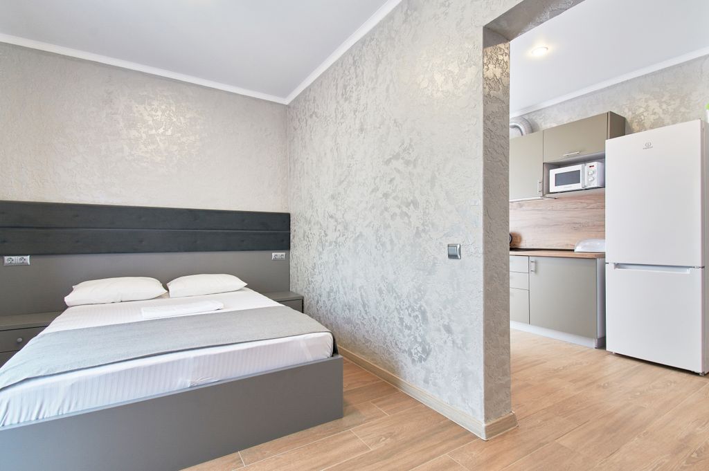 Семейный номер двухкомнатный  номер люкс с кухней и  видом на горы