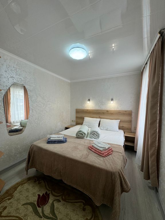 Четырёхместный номер стандарт с видом на горы